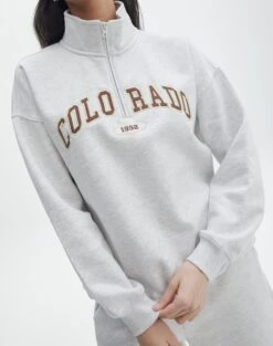 Oversized Embroidered Quarter Zip Sweater -GLASSONS CLOTHING olivia oversized quarter zip coloradosnow marle imageback tl97172oemb