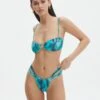 Printed Strappy Ruched Bikini Bottom -GLASSONS CLOTHING r sloanne split ruched bikini brief mystic butterflies front ga136181rmsb 1